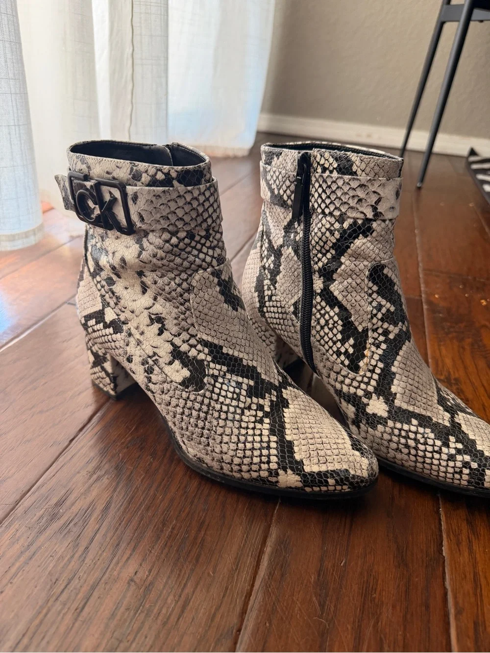 Calvin Klein Black & Ivory Snakeskin-Print Ankle Booties
